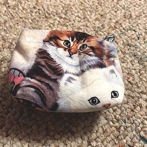 Tiny purse with cat designs. Cute for kids and a great birthday gift